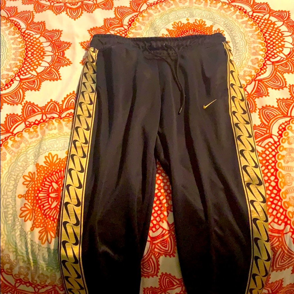 Nike track pants. Size S
